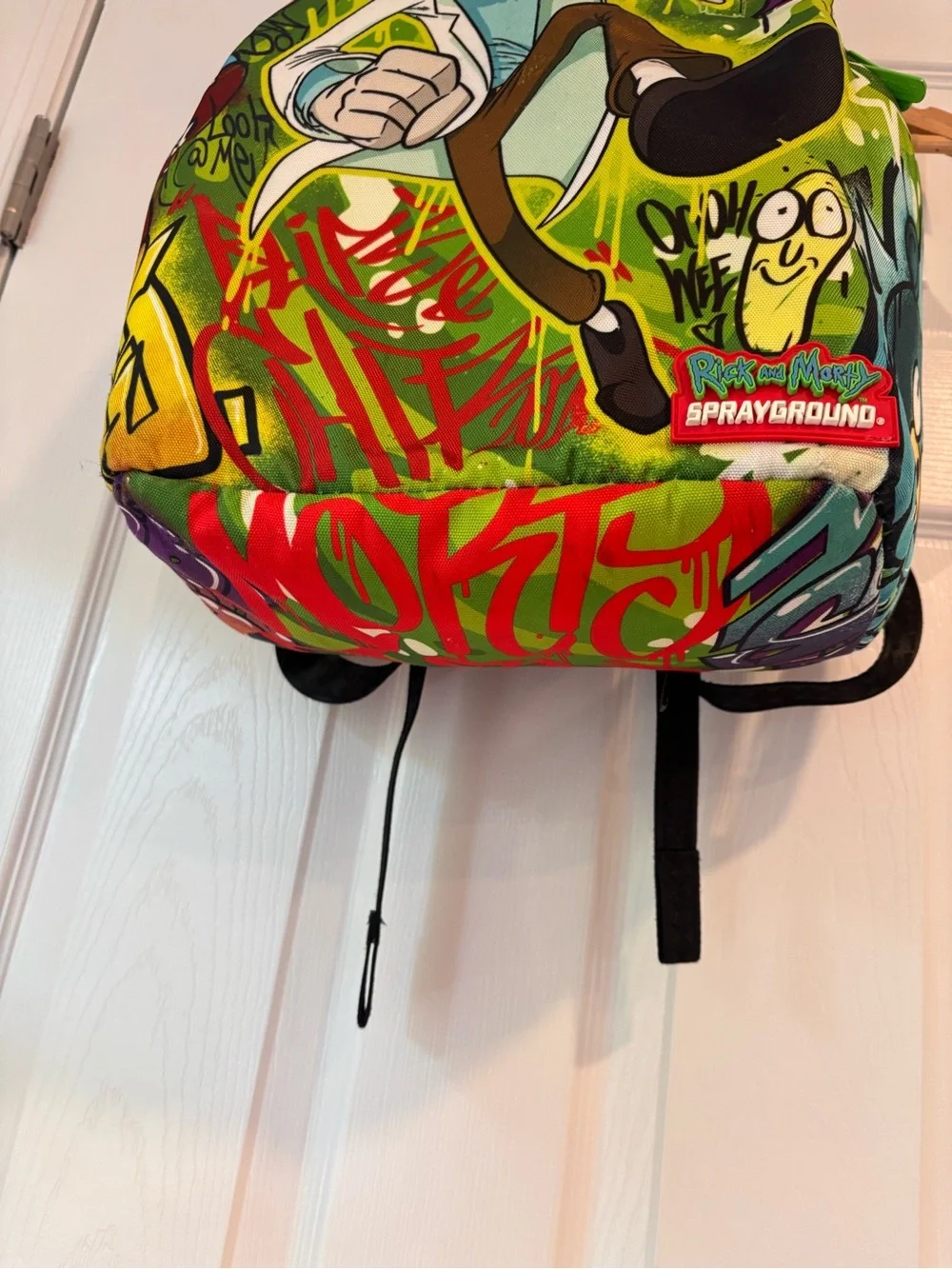 Sprayground Rick and Morty: Genius Backpack in green graffiti design